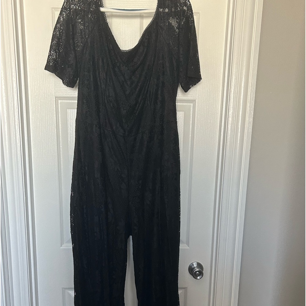 Black lace jumpsuit. Worn once. Size 3 is equivalent of 22-24.